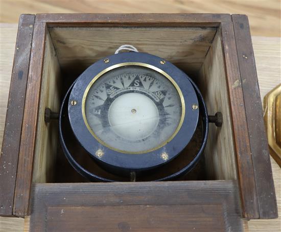 A cased ships compass